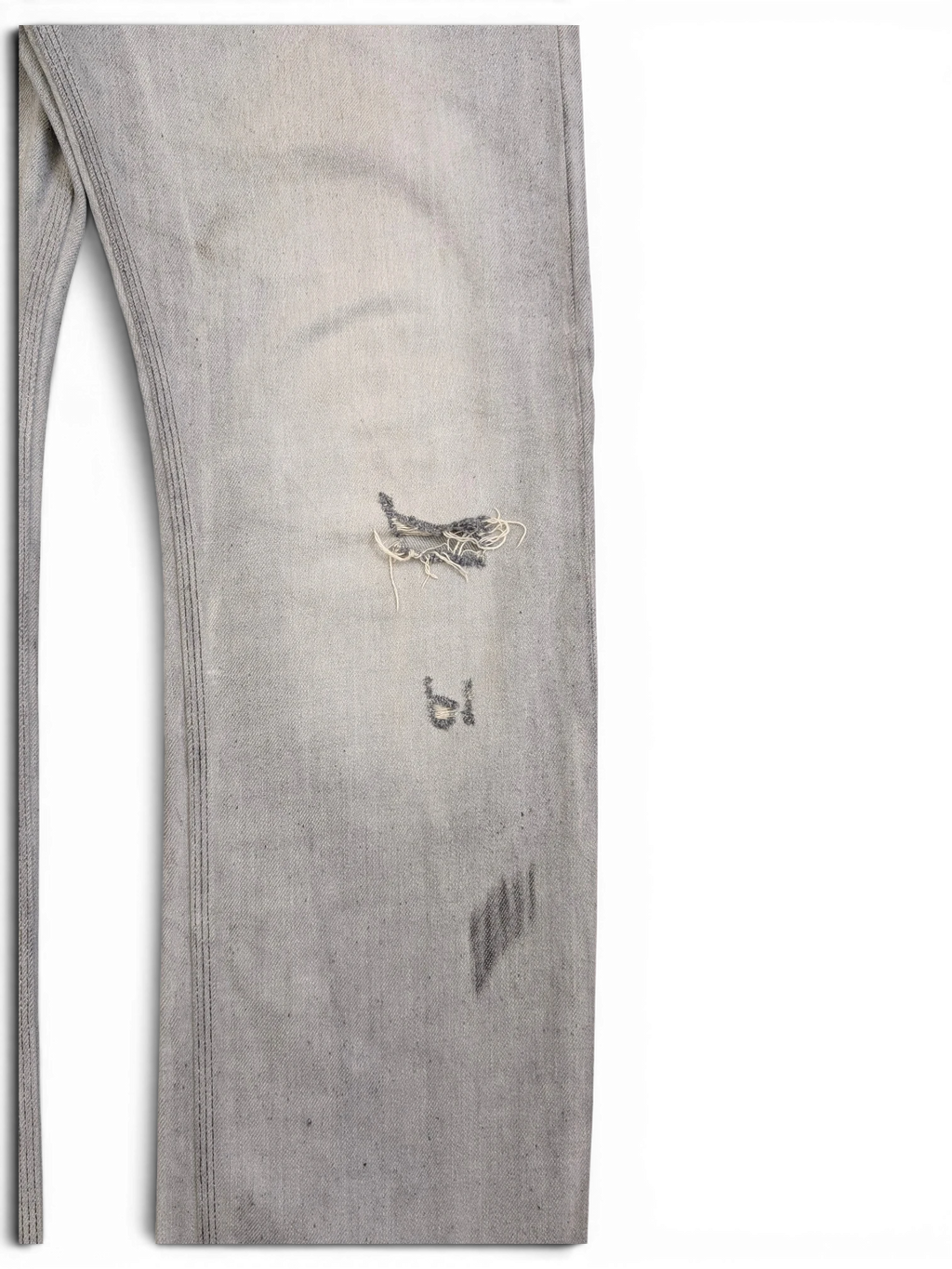 JAKE & IPI light wash distressed denim jeans with ripped knee and graphic print