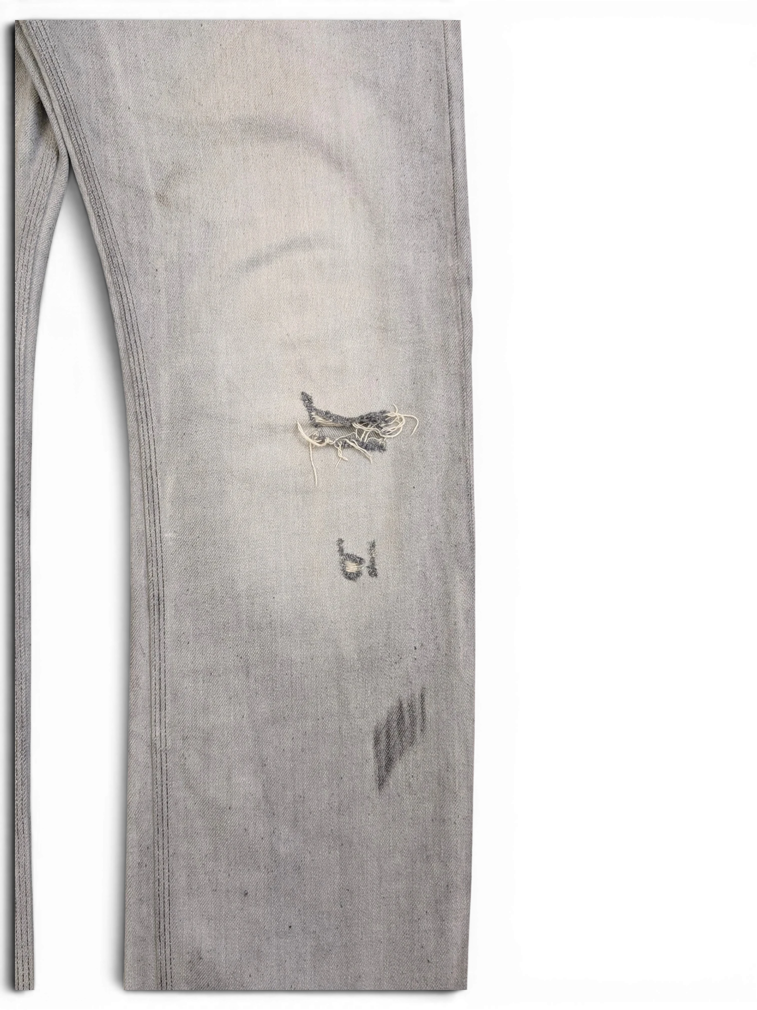JAKE & IPI light wash distressed denim jeans with ripped knee and graphic print