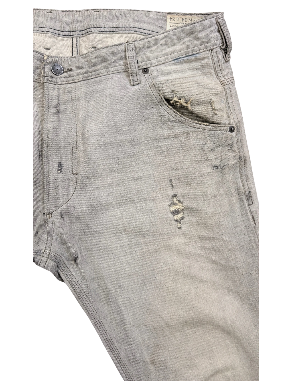 JAKE & IPI light grey distressed denim jeans with rips and fading, size W34 L34.