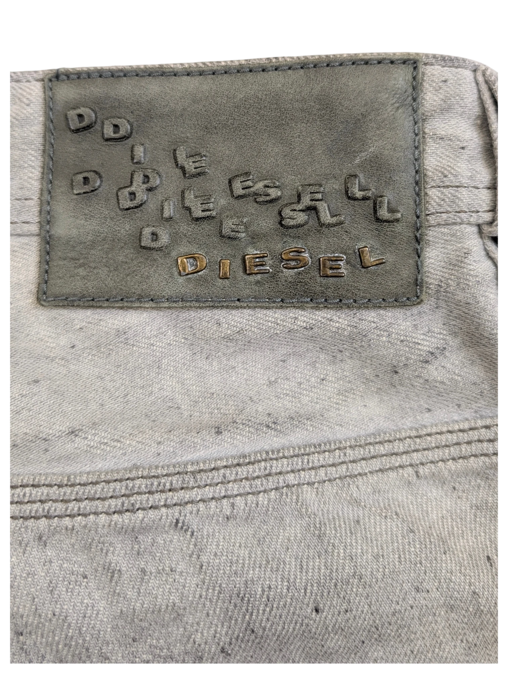 JAKE & IPI light grey Diesel Krooley jeans with embossed leather patch and double stitching detail.