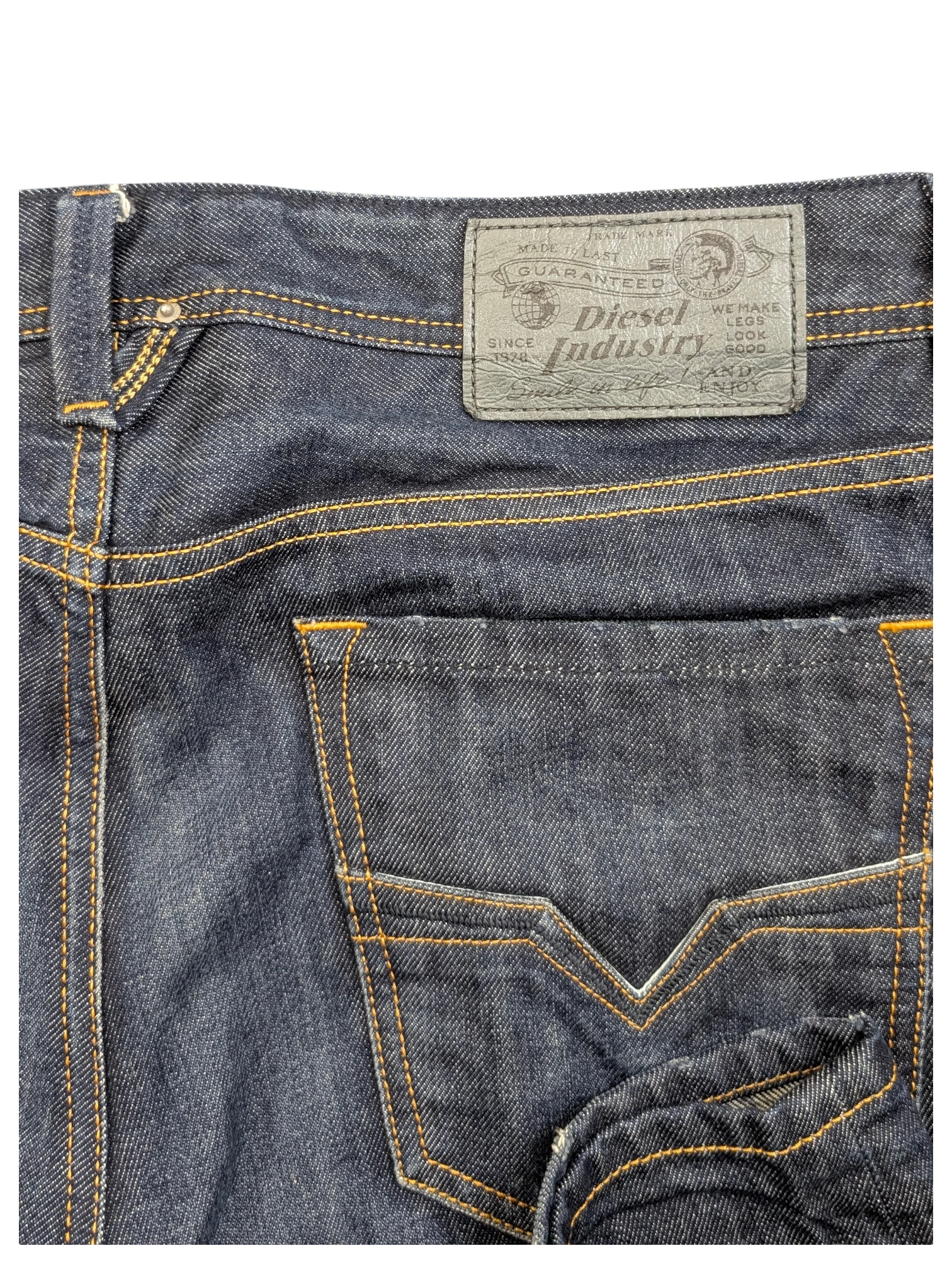 JAKE & IPI Diesel Larkee dark wash denim jeans with orange stitching and leather logo patch.