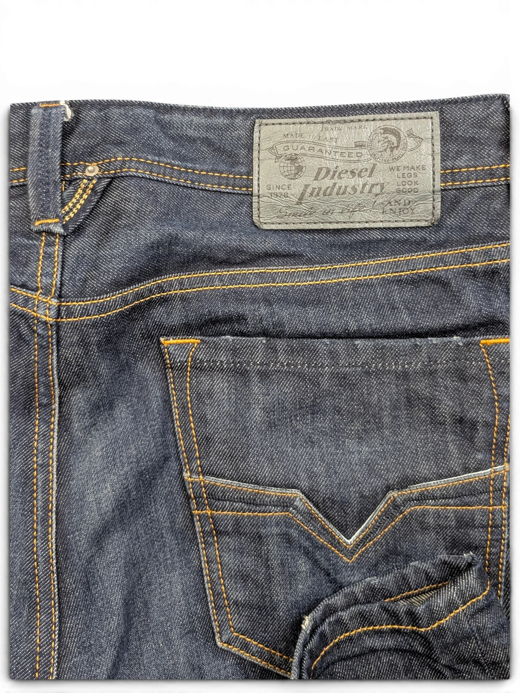 JAKE & IPI Diesel Larkee dark wash denim jeans with orange stitching and leather logo patch.