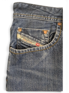 JAKE & IPI Diesel Larkee W34 L30 blue denim jeans with copper rivets and signature Diesel Industry tag.