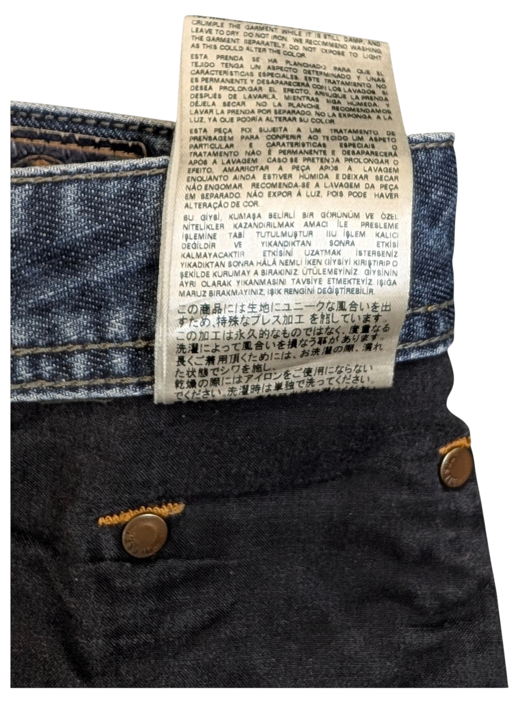 JAKE & IPI Diesel Larkee W34 L30 dark wash denim jeans with copper button details.