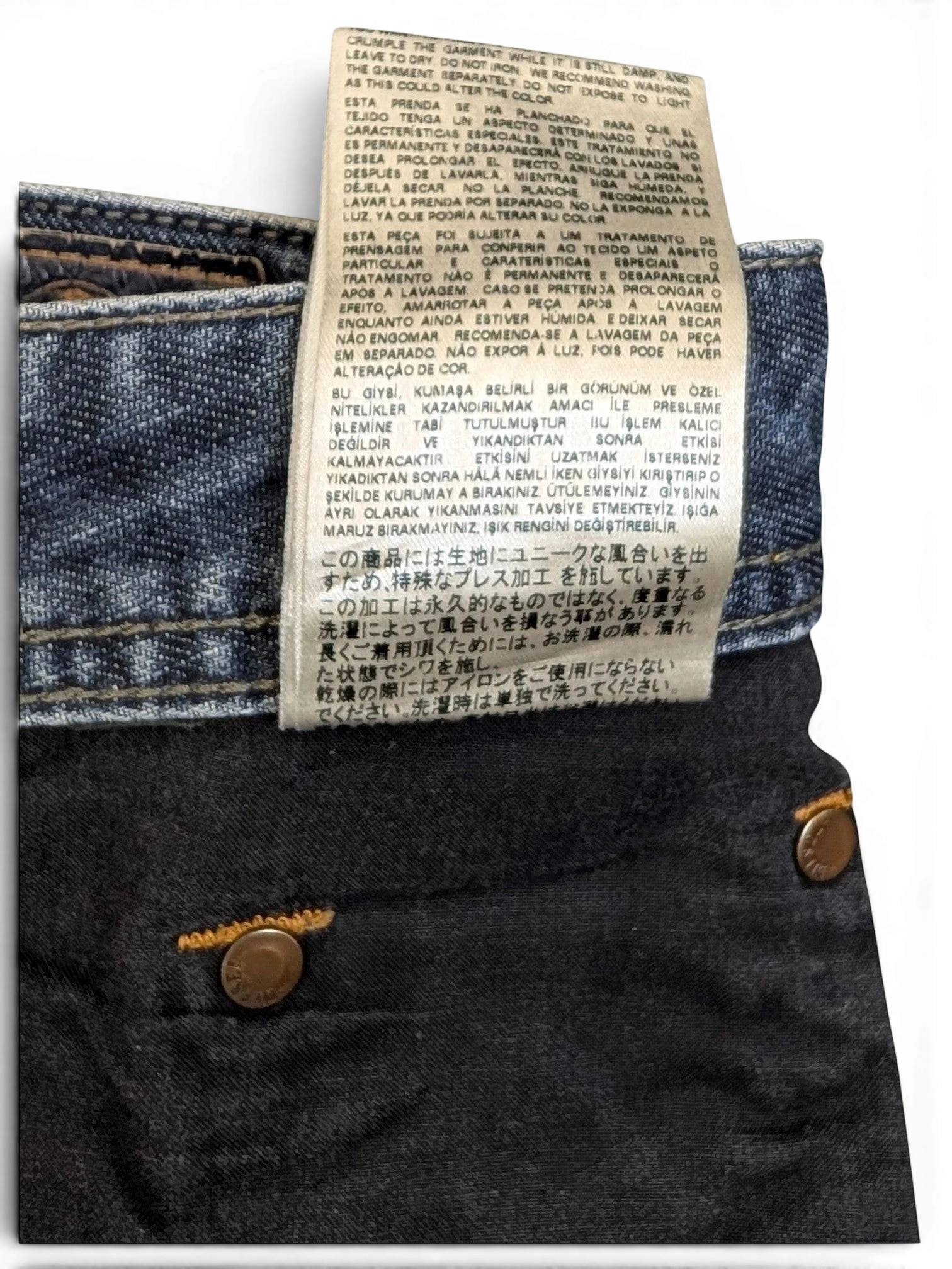JAKE & IPI Diesel Larkee W34 L30 dark wash denim jeans with copper button details.