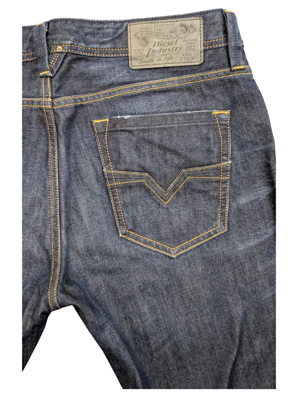 JAKE & IPI Diesel Larkee dark wash denim jeans with yellow stitching and V-shaped back pocket detail.