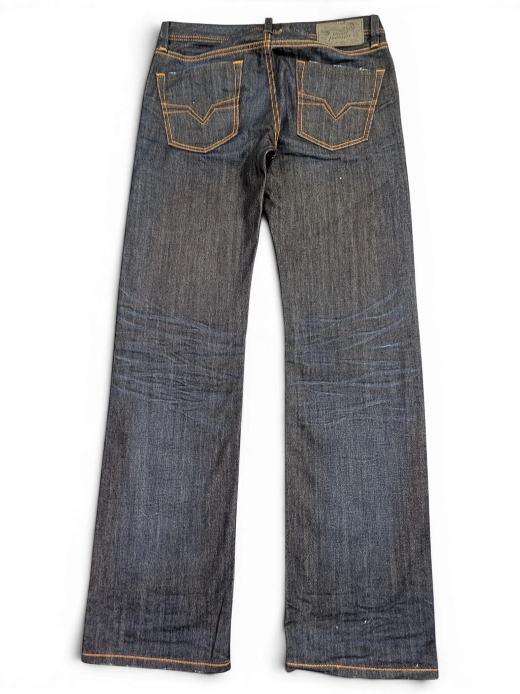 JAKE & IPI Diesel Larkee dark wash denim jeans with orange stitching and a leather logo patch. Size W31 L32.
