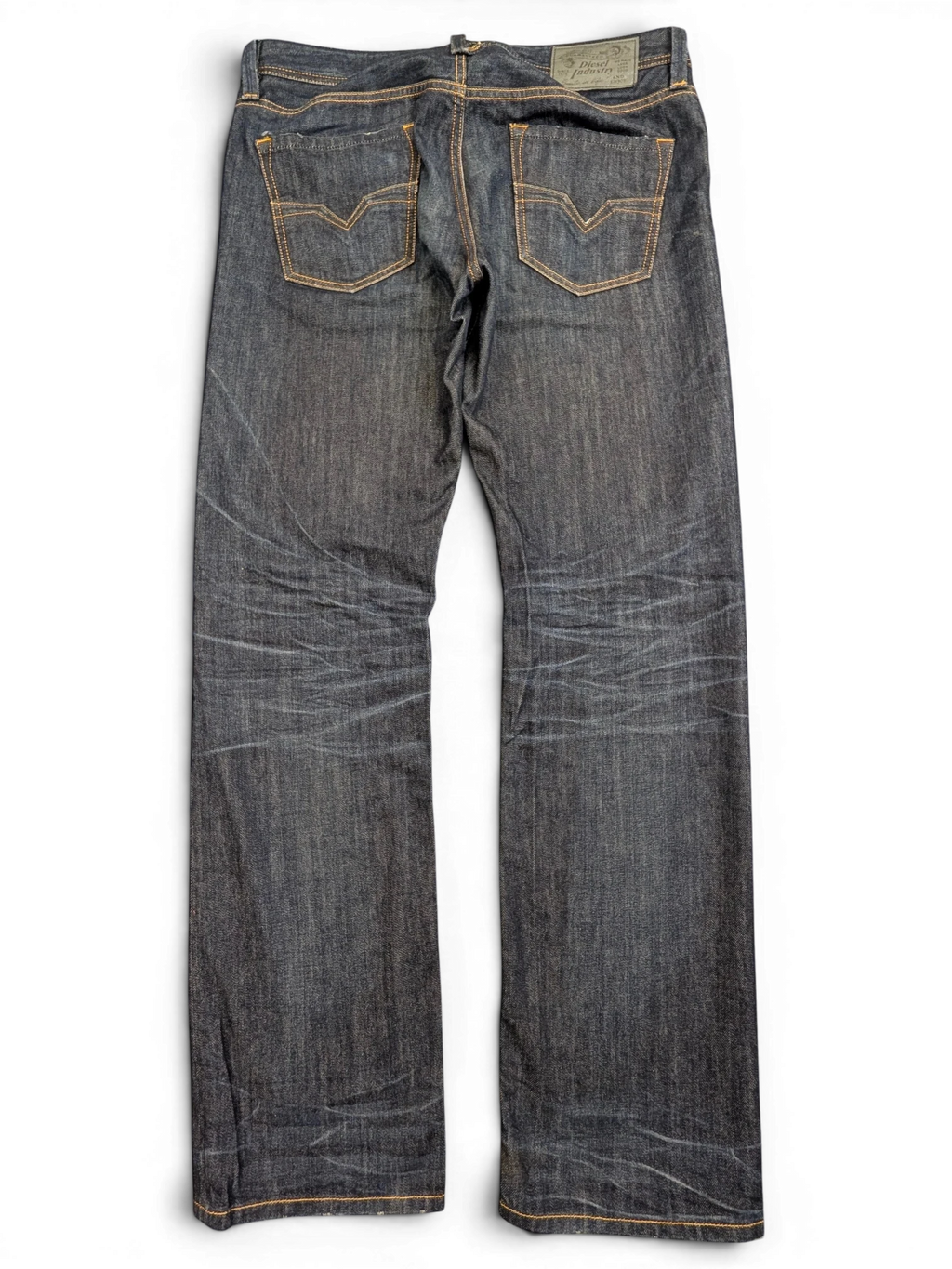 JAKE & IPI dark wash denim jeans with orange stitching, size W33 L32, featuring whiskering and fading.