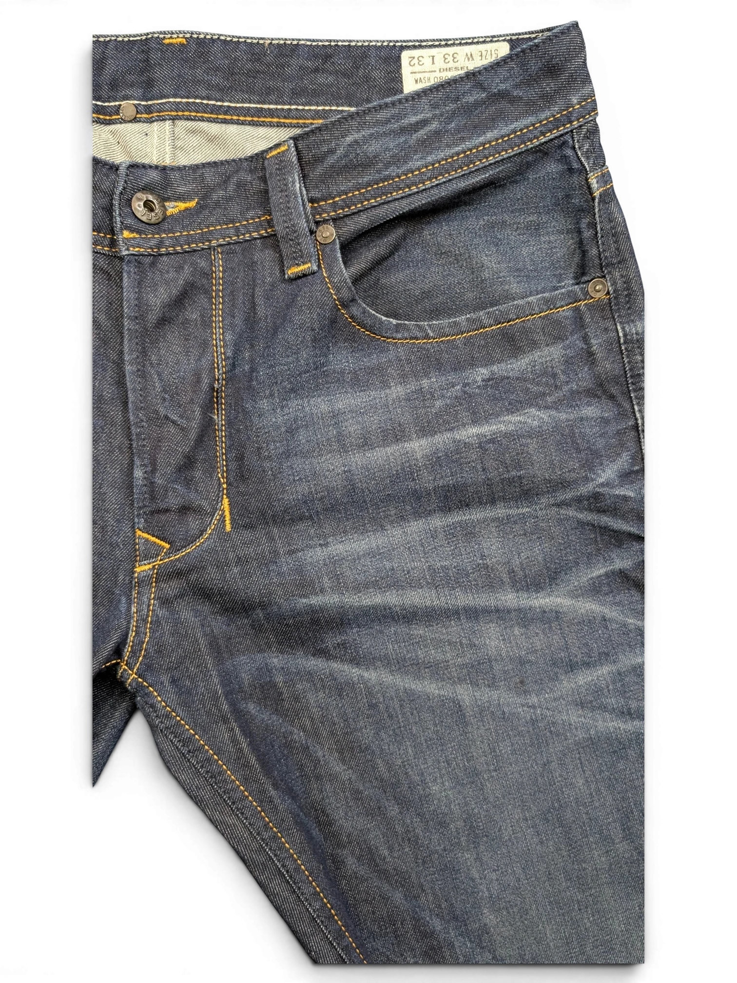 JAKE & IPI Diesel Larkee jeans in dark wash denim with yellow stitching and distressed details. Size 33x32.