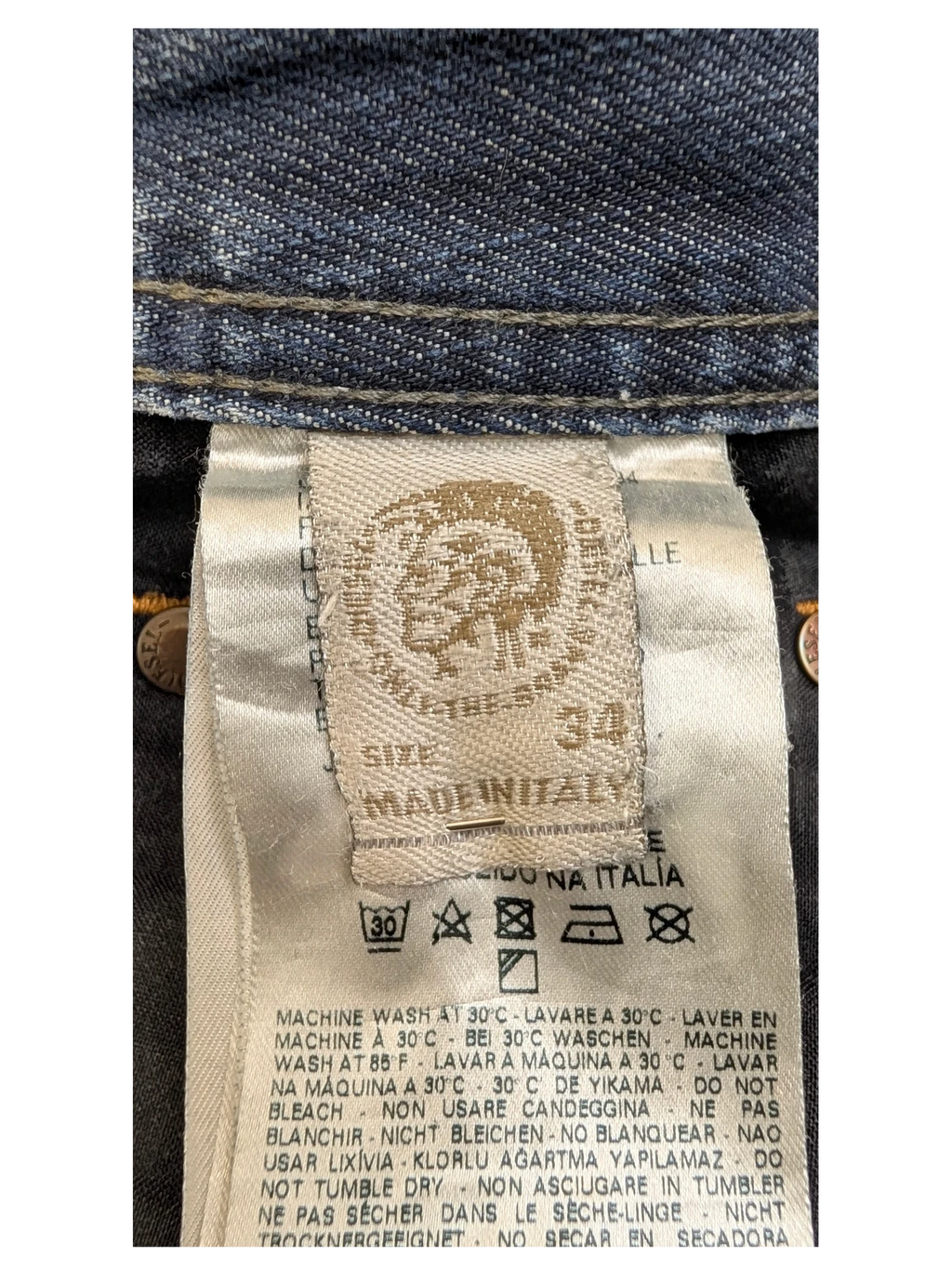JAKE & IPI Diesel Larkee jeans, size 34, made in Italy. Blue denim with care instructions.