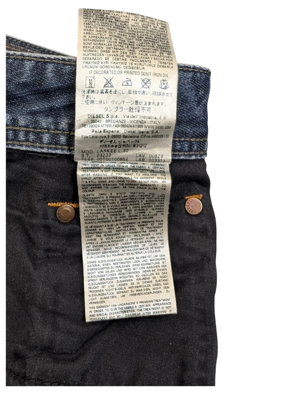 JAKE & IPI Diesel Larkee W34 L30 blue denim jeans with distressed detailing and branded buttons.
