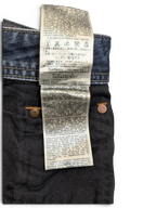 JAKE & IPI Diesel Larkee W34 L30 blue denim jeans with distressed detailing and branded buttons.