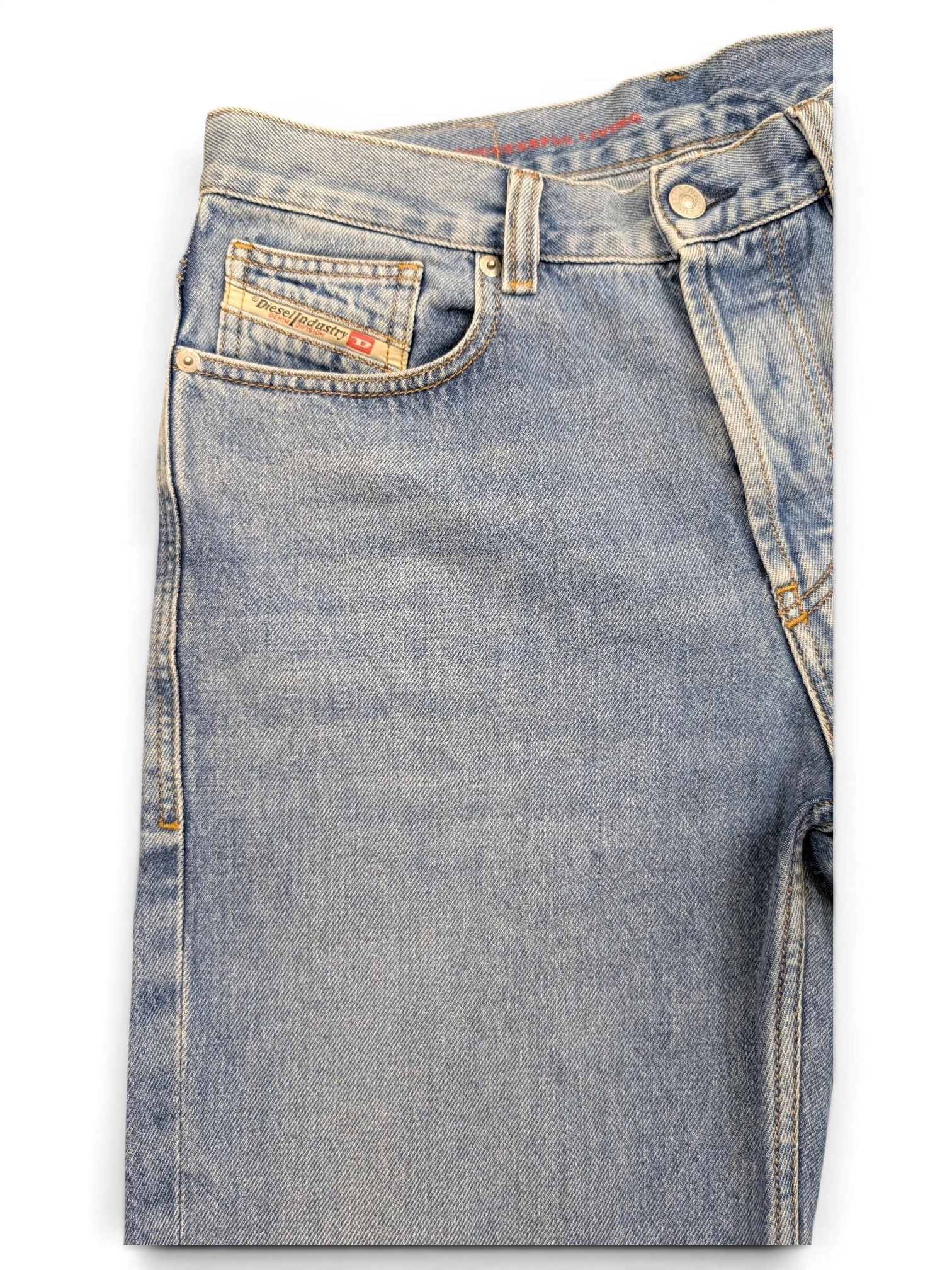 JAKE & IPI light wash denim jeans with red stitching detail and Diesel Industry coin pocket.