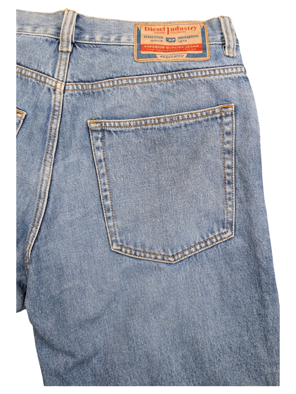 JAKE & IPI light wash denim jeans with classic 5-pocket styling and a leather brand patch.