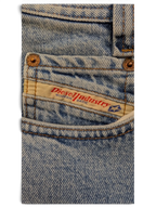 JAKE & IPI light wash denim jeans with Diesel Industry Modern Basic label and copper rivets.