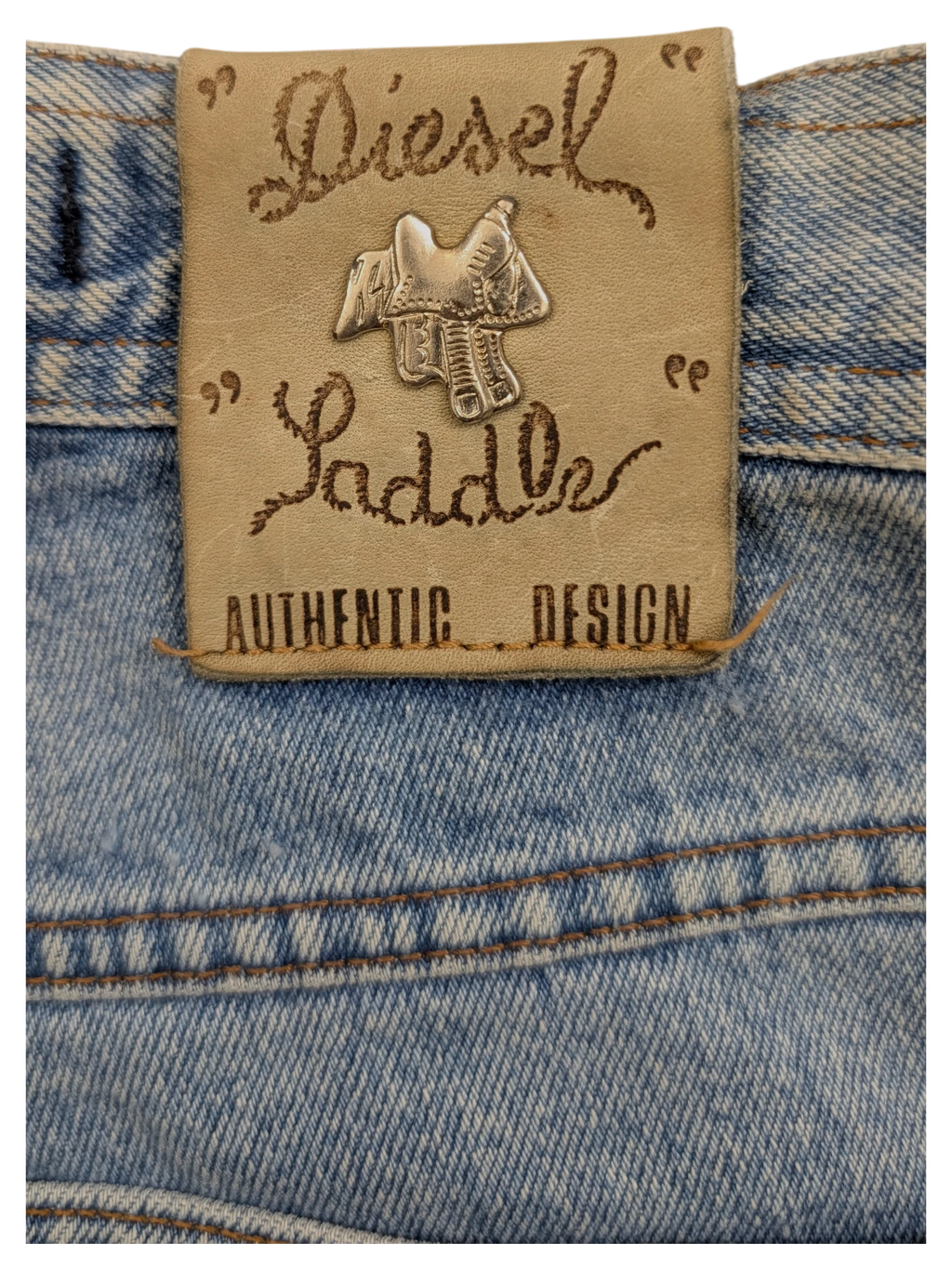 JAKE & IPI Diesel Modern Basic W28 L31 light wash denim jeans with leather patch featuring saddle emblem.