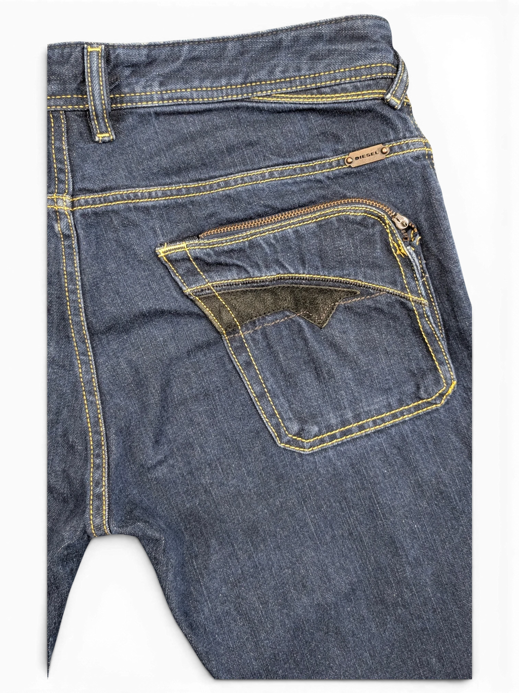 JAKE & IPI Diesel Poiak dark wash denim jeans with yellow stitching and a zippered back pocket with black accent.