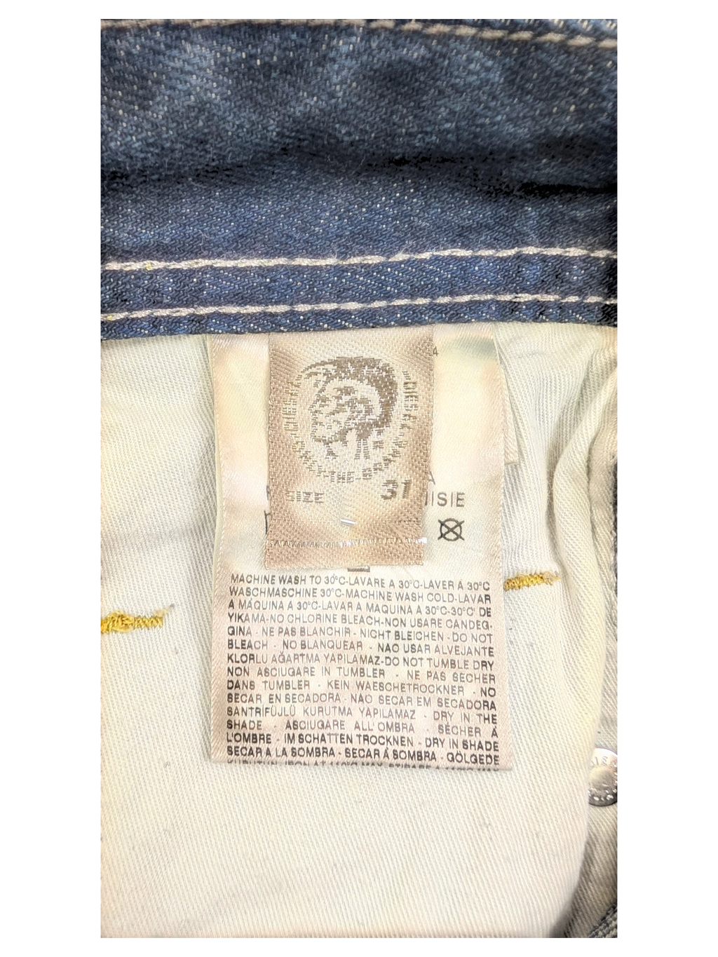 JAKE & IPI Diesel Poiak W31 L34 blue denim jeans with care label detail.