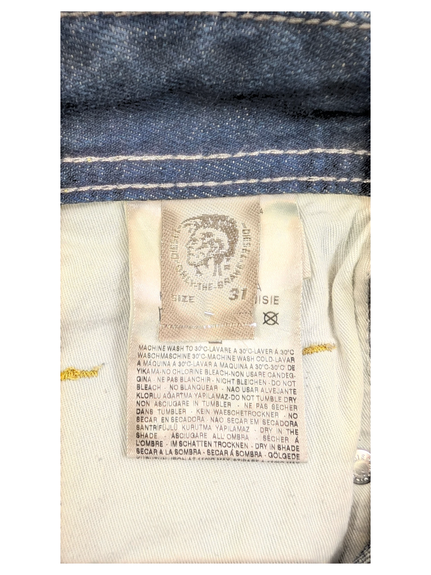 JAKE & IPI Diesel Poiak W31 L34 blue denim jeans with care label detail.