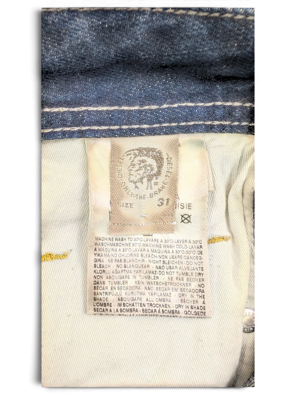 JAKE & IPI Diesel Poiak W31 L34 blue denim jeans with care label detail.