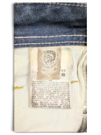 JAKE & IPI Diesel Poiak W31 L34 blue denim jeans with care label detail.