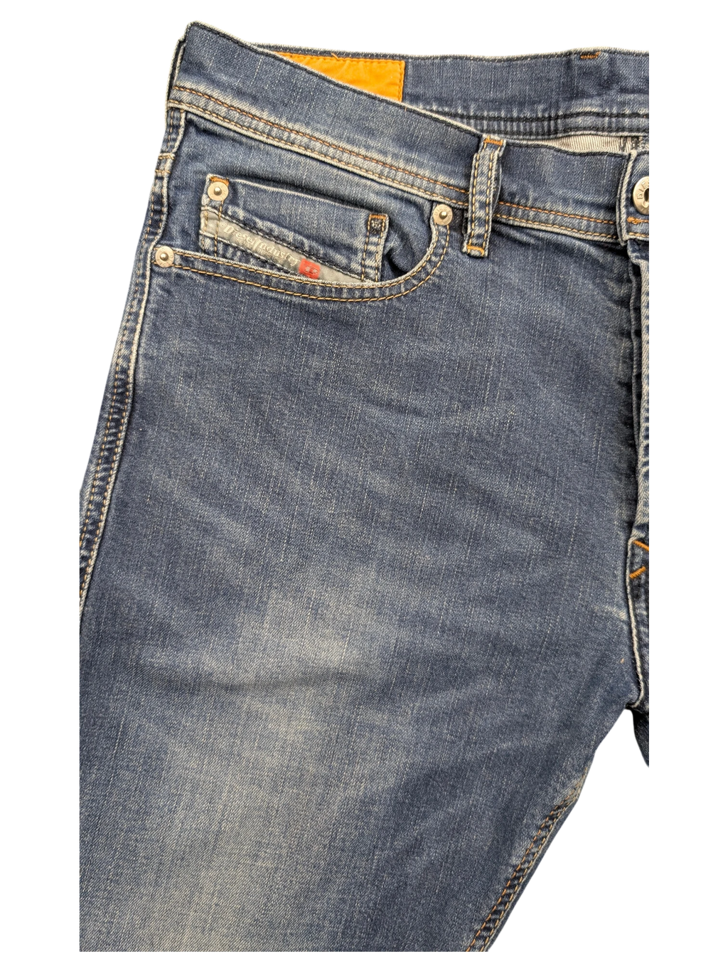 JAKE & IPI Diesel Tepphar blue denim jeans with orange brand tag and red accent on coin pocket.