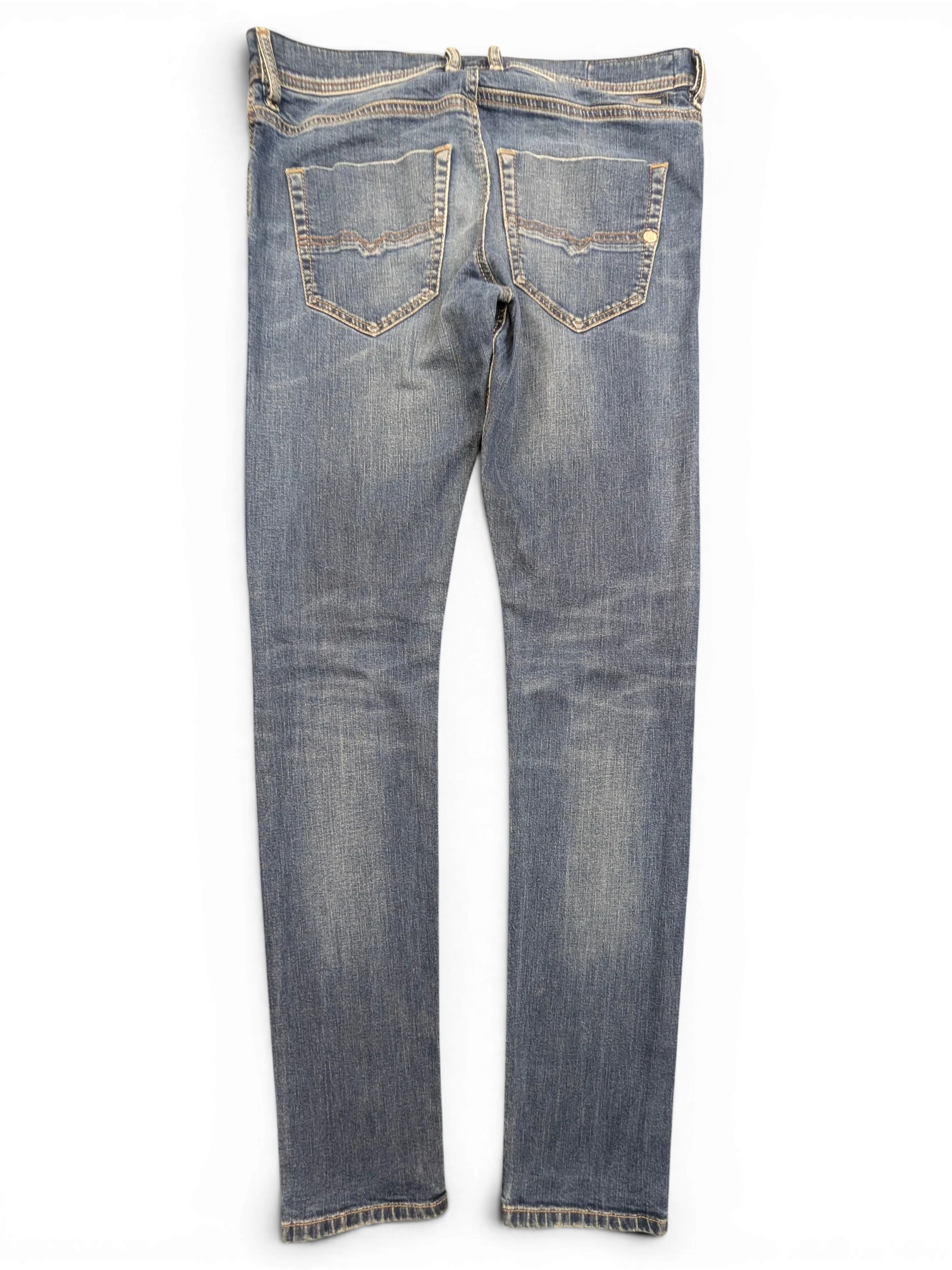 JAKE & IPI Diesel Tepphar blue denim jeans with a slim fit and distressed detailing. Size W32 L34.