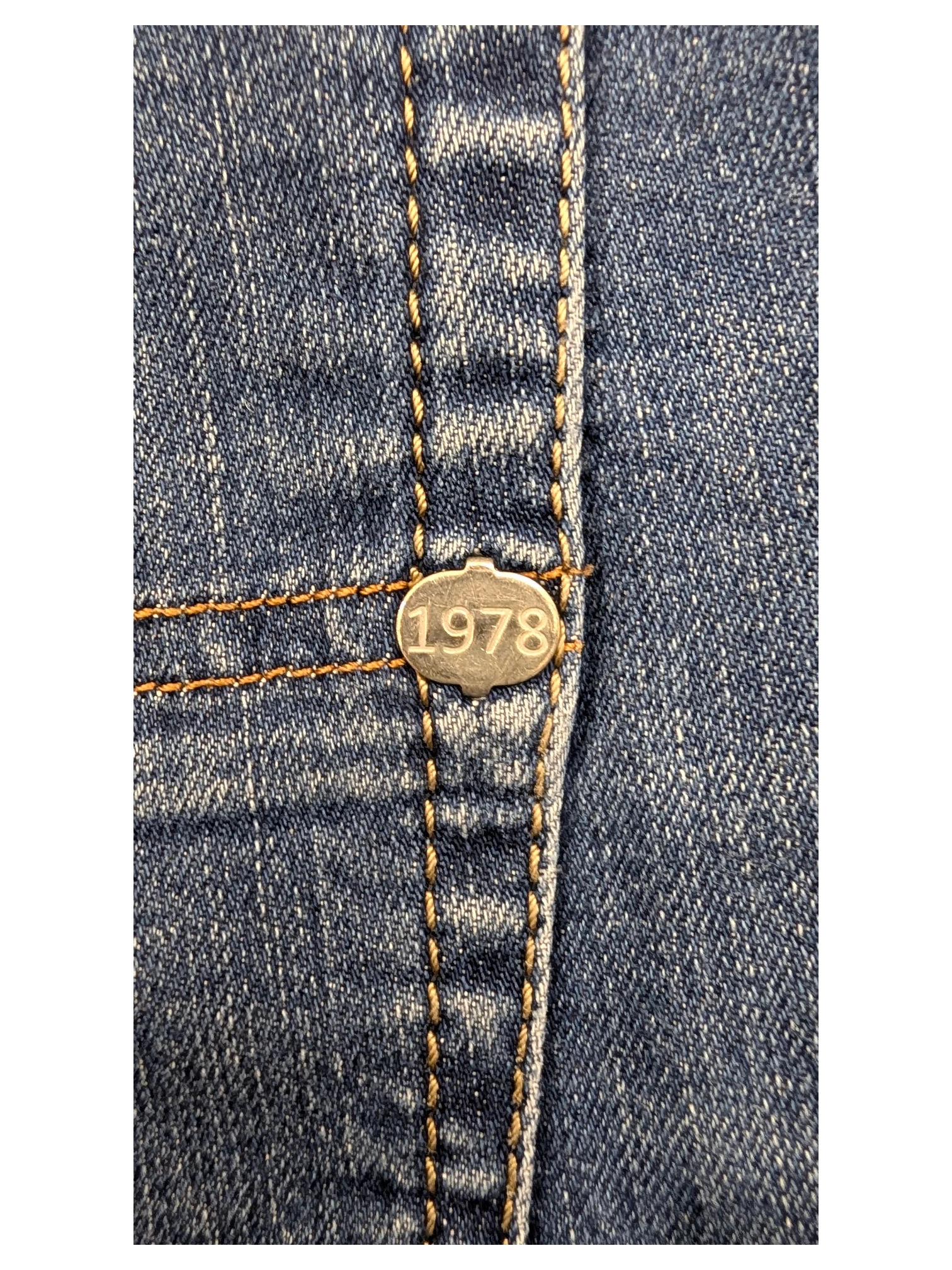 JAKE & IPI Diesel Tepphar jeans with silver button detail featuring the year 1978.