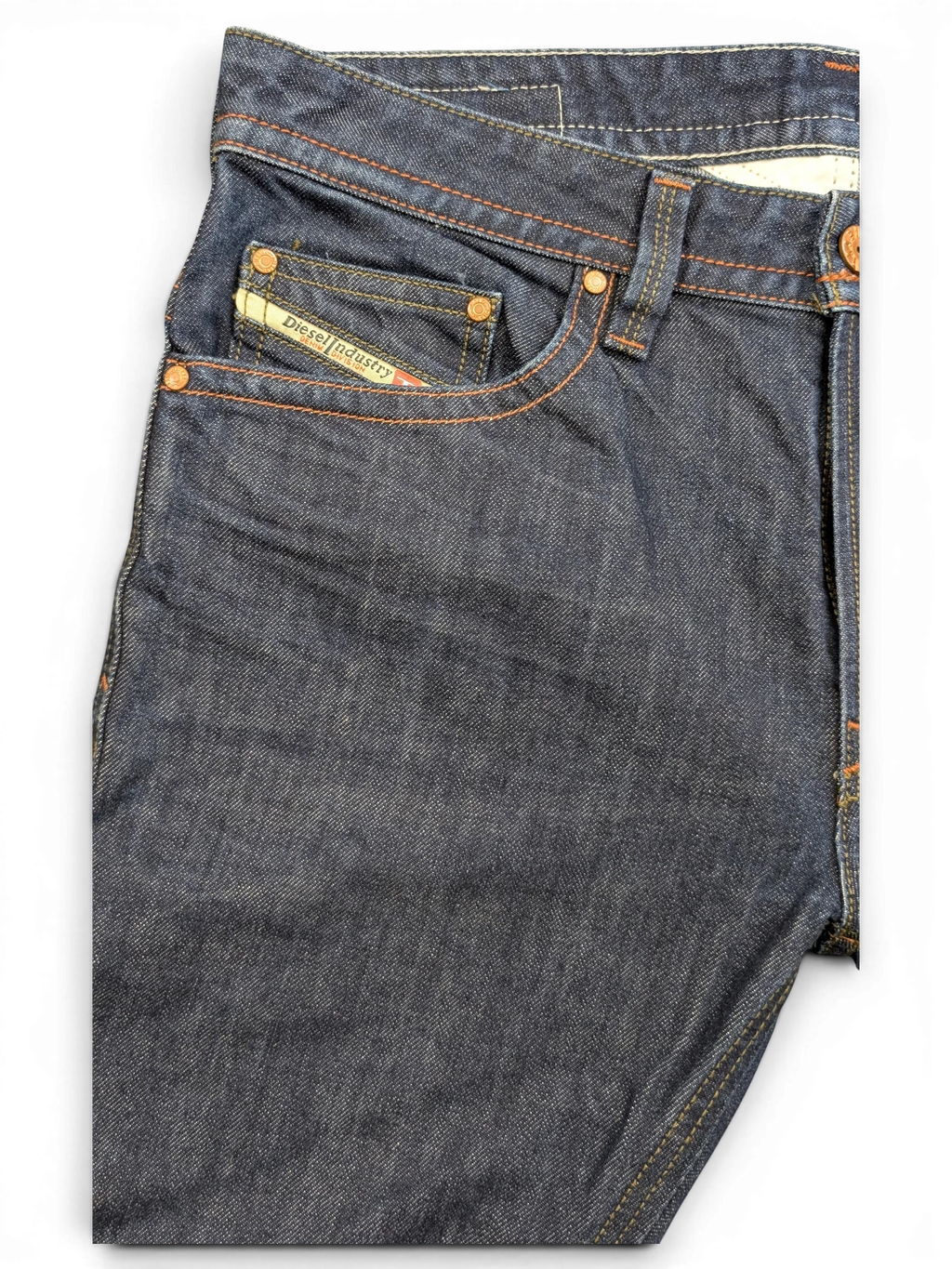 JAKE & IPI Diesel Thavar dark wash denim jeans with orange stitching and Diesel Industry logo patch.