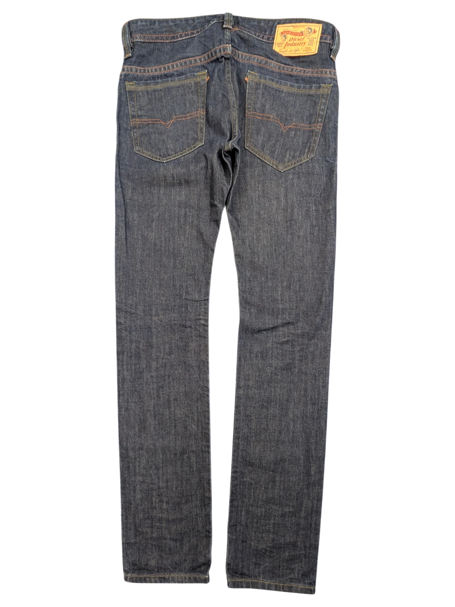 JAKE & IPI Diesel Thavar dark wash denim jeans with orange stitching and signature V-stitching on back pockets.