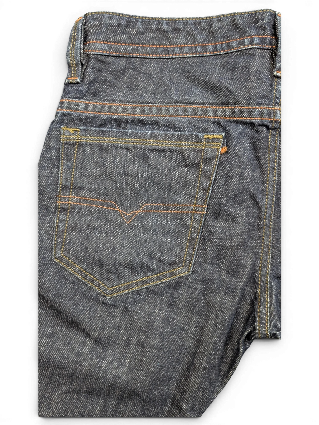 JAKE & IPI dark wash denim jeans with orange stitching and V-shaped back pocket detail