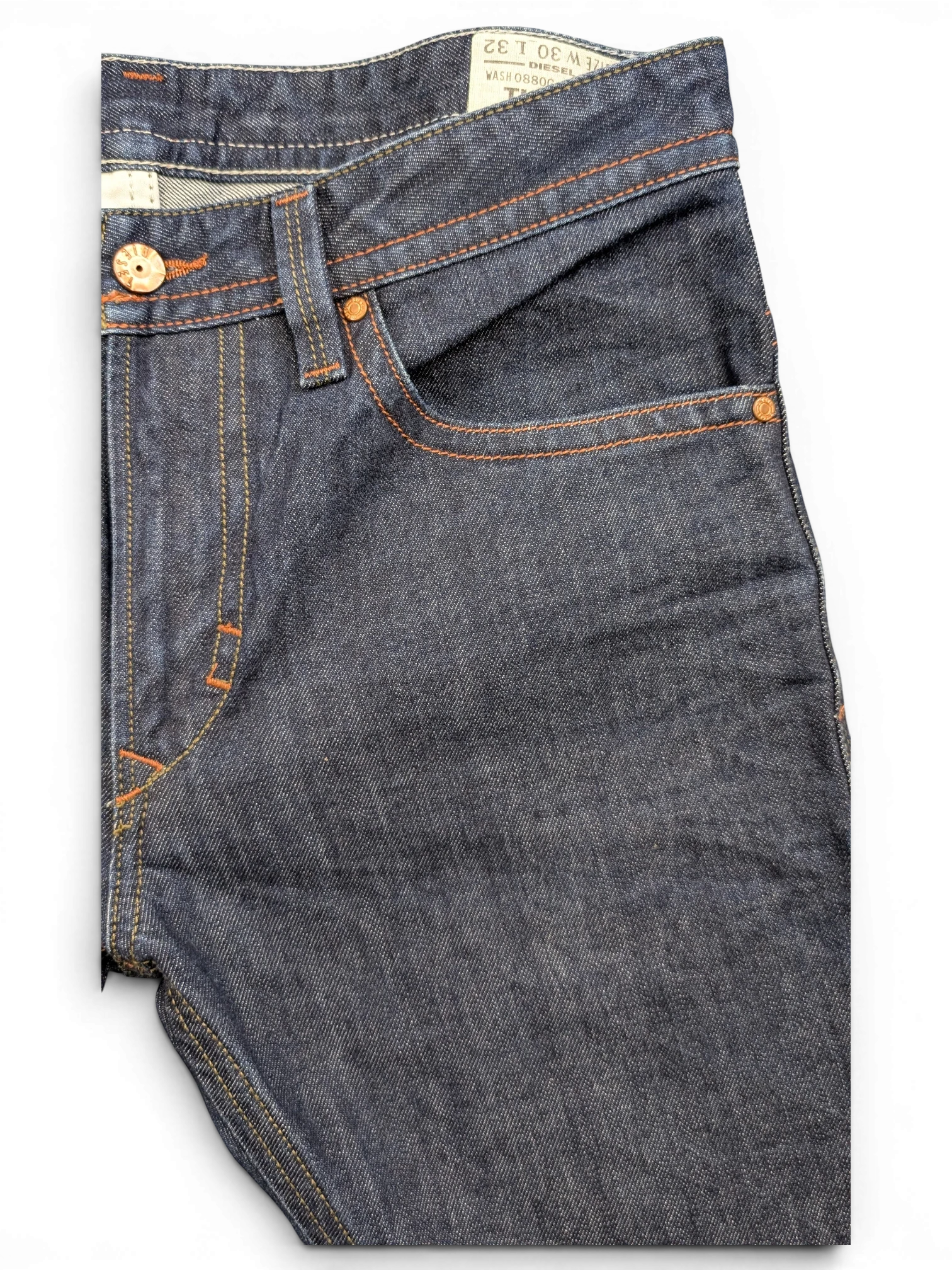 JAKE & IPI dark wash denim jeans with orange stitching and copper button details. Size W30 L32.