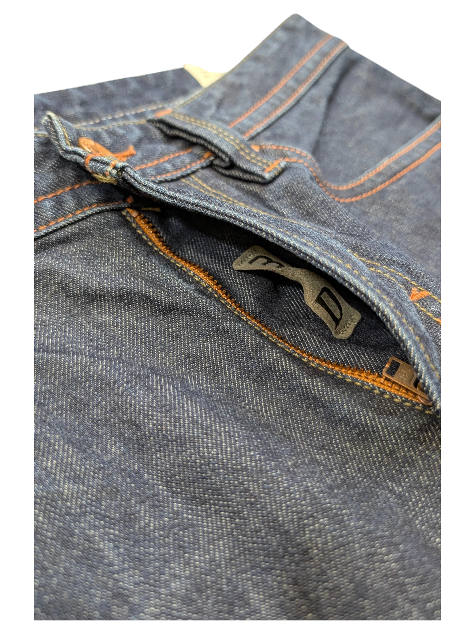 JAKE & IPI dark wash denim jeans with orange stitching and a zip pocket detail.