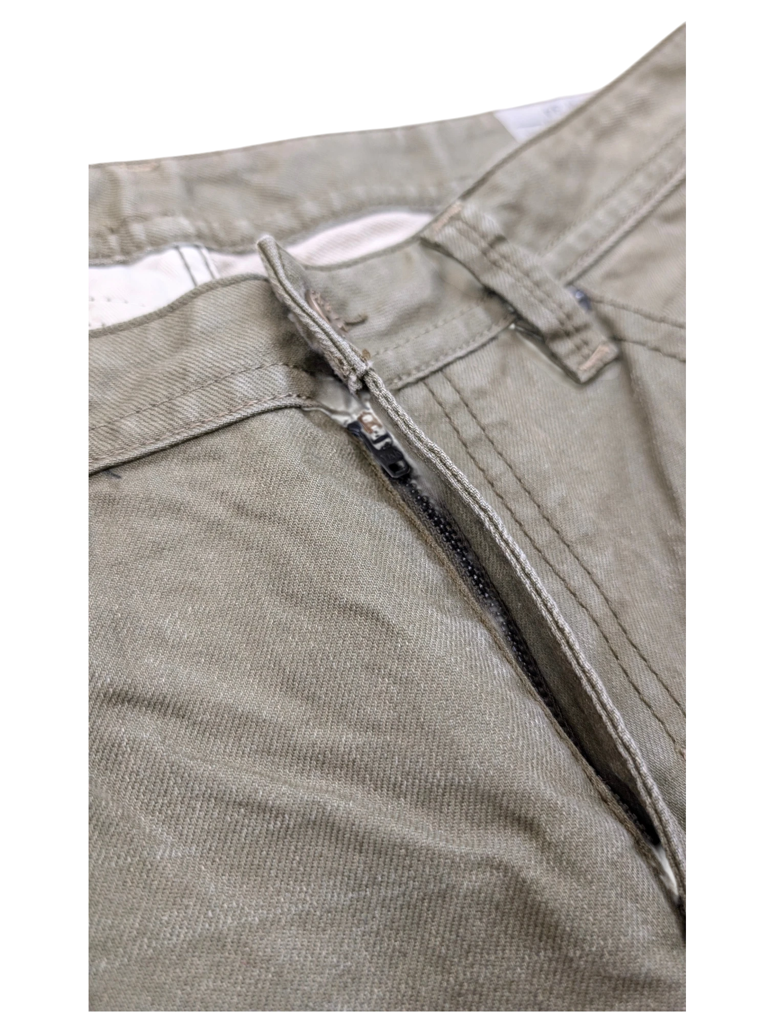 JAKE & IPI olive green Diesel Thavar jeans with zip fly and button closure. Cotton blend.