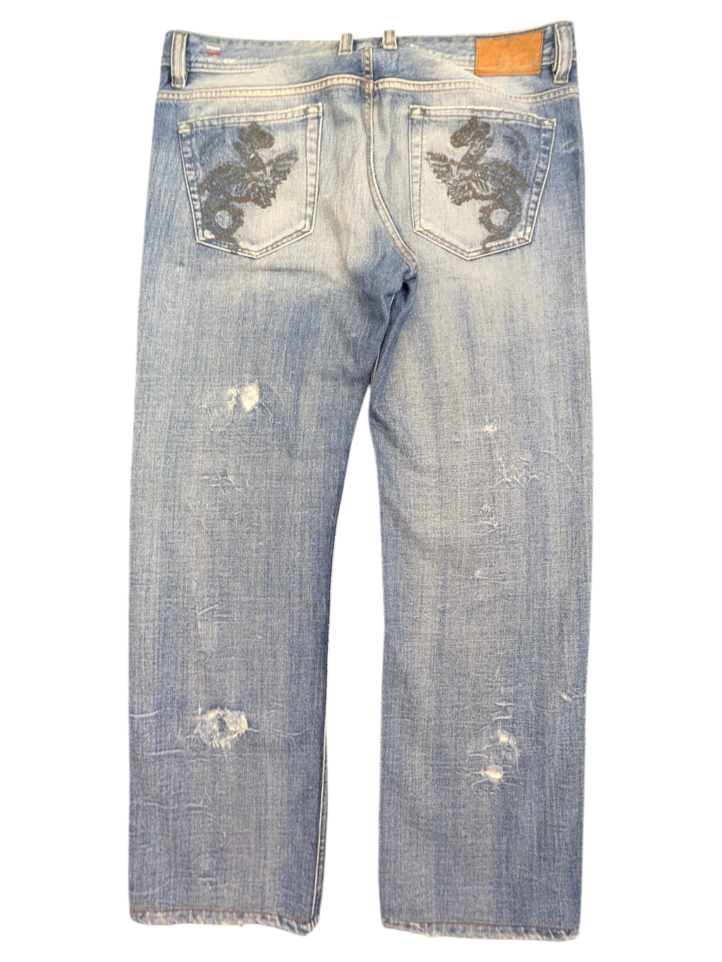 JAKE & IPI light wash denim jeans with distressed details and embroidered dragon design on back pockets. W36 L34.