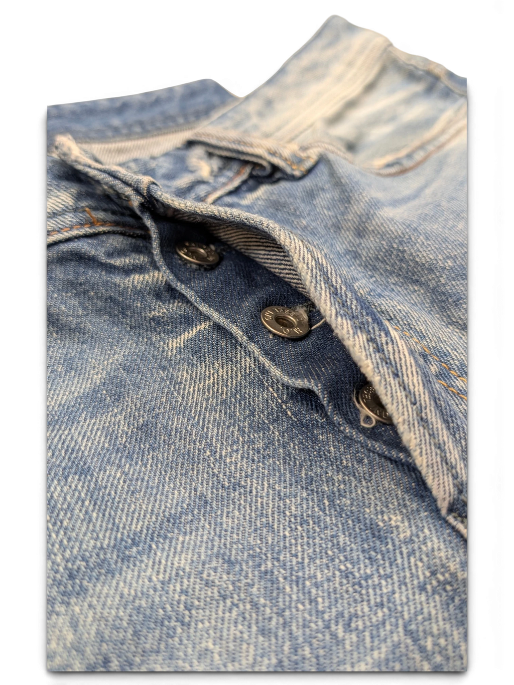 JAKE & IPI Diesel Viker jeans in light wash denim with button fly closure and branded metal buttons.