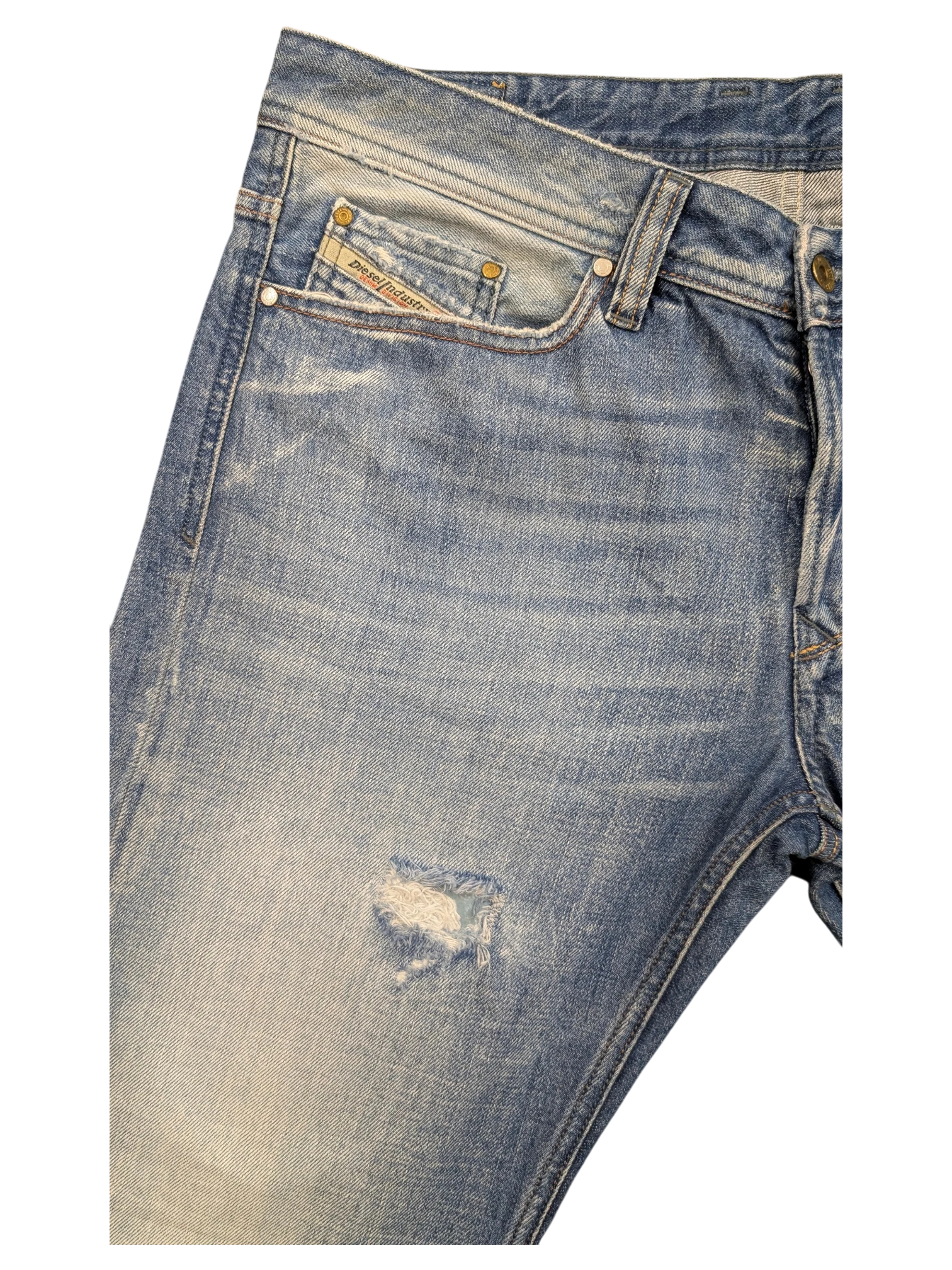 JAKE & IPI Diesel Viker light wash denim jeans with a distressed rip on the left leg and a coin pocket.