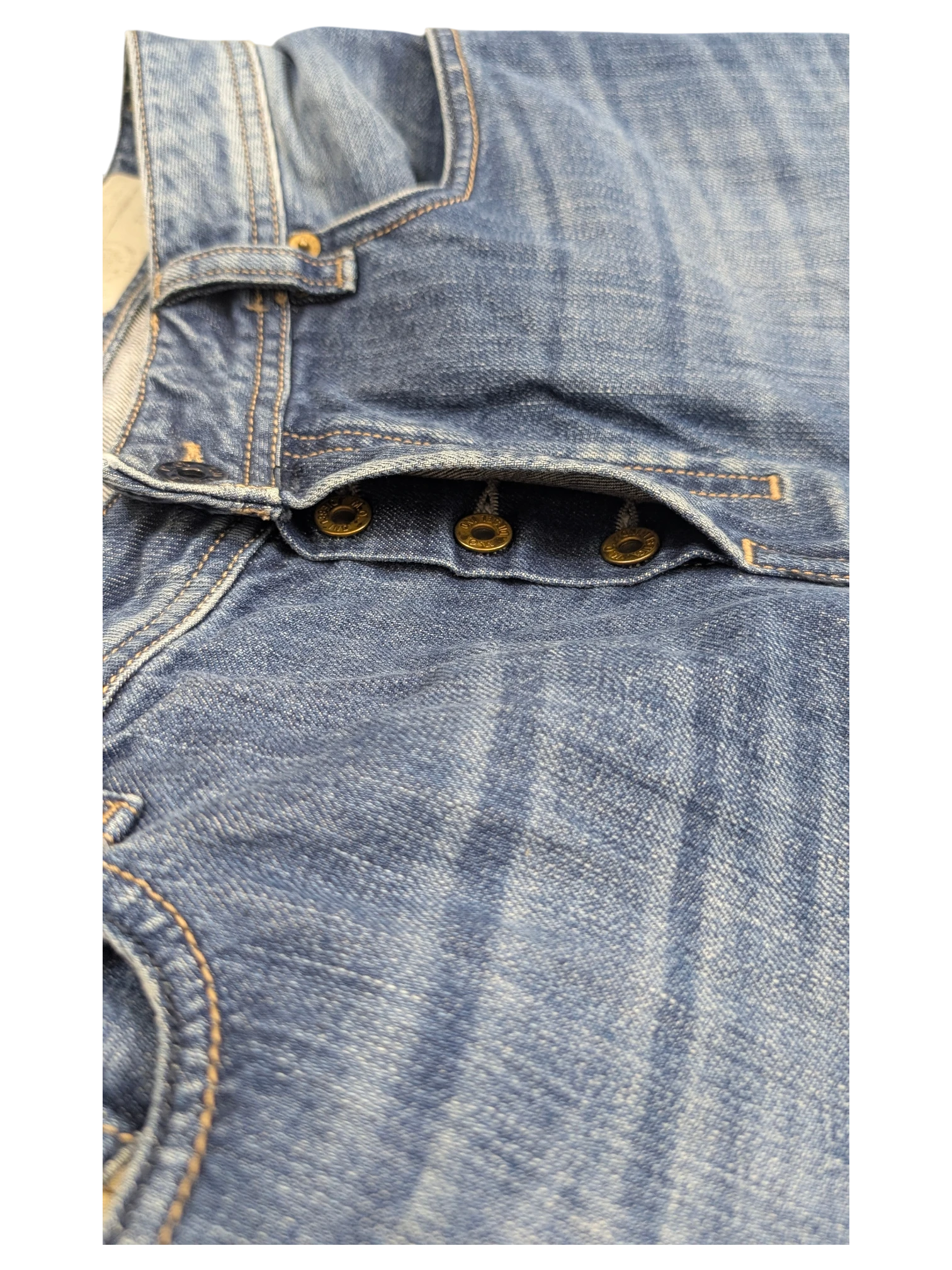 JAKE & IPI Diesel Zatiny bootcut jeans in blue denim with button fly and distressed details.