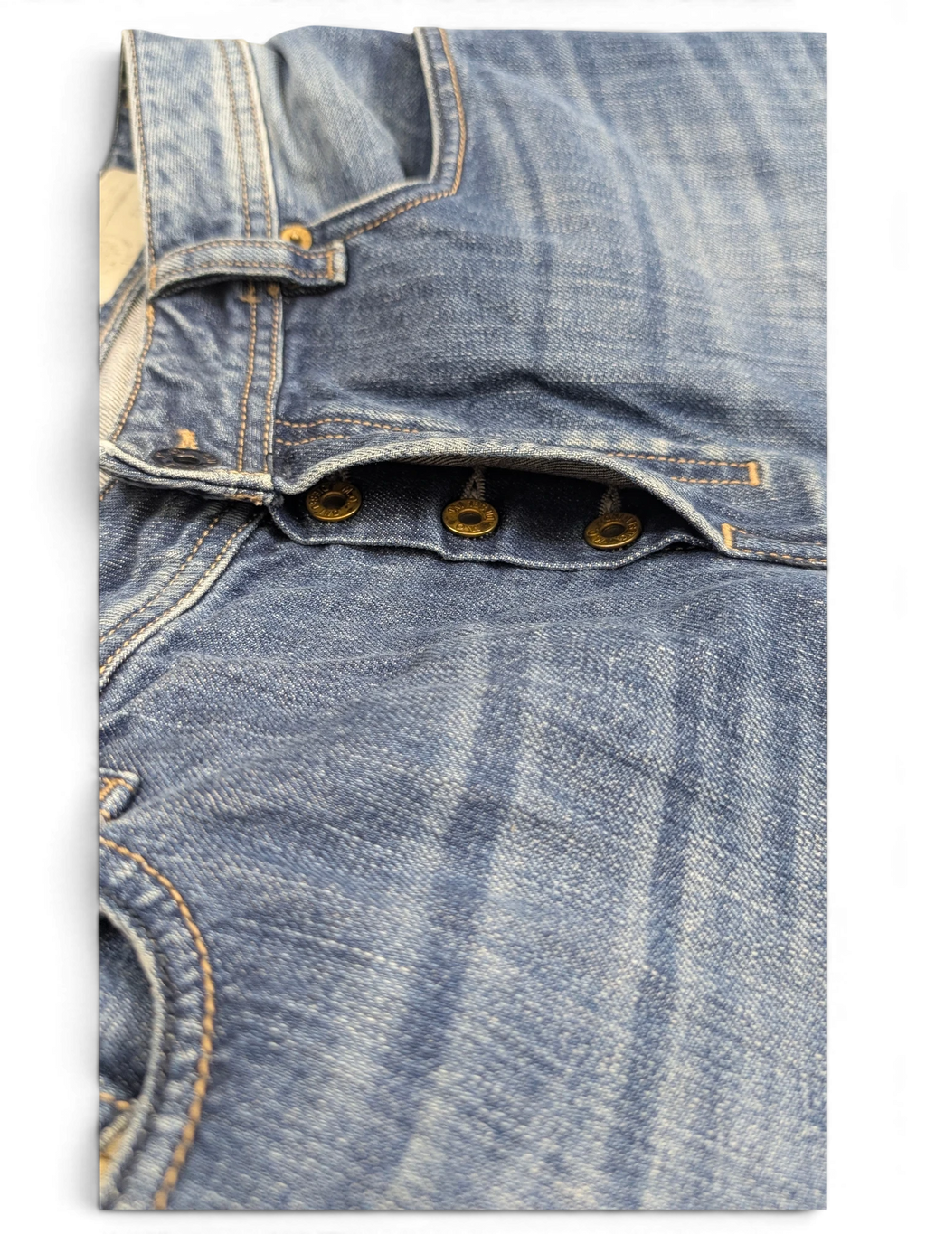 JAKE & IPI Diesel Zatiny bootcut jeans in blue denim with button fly and distressed details.