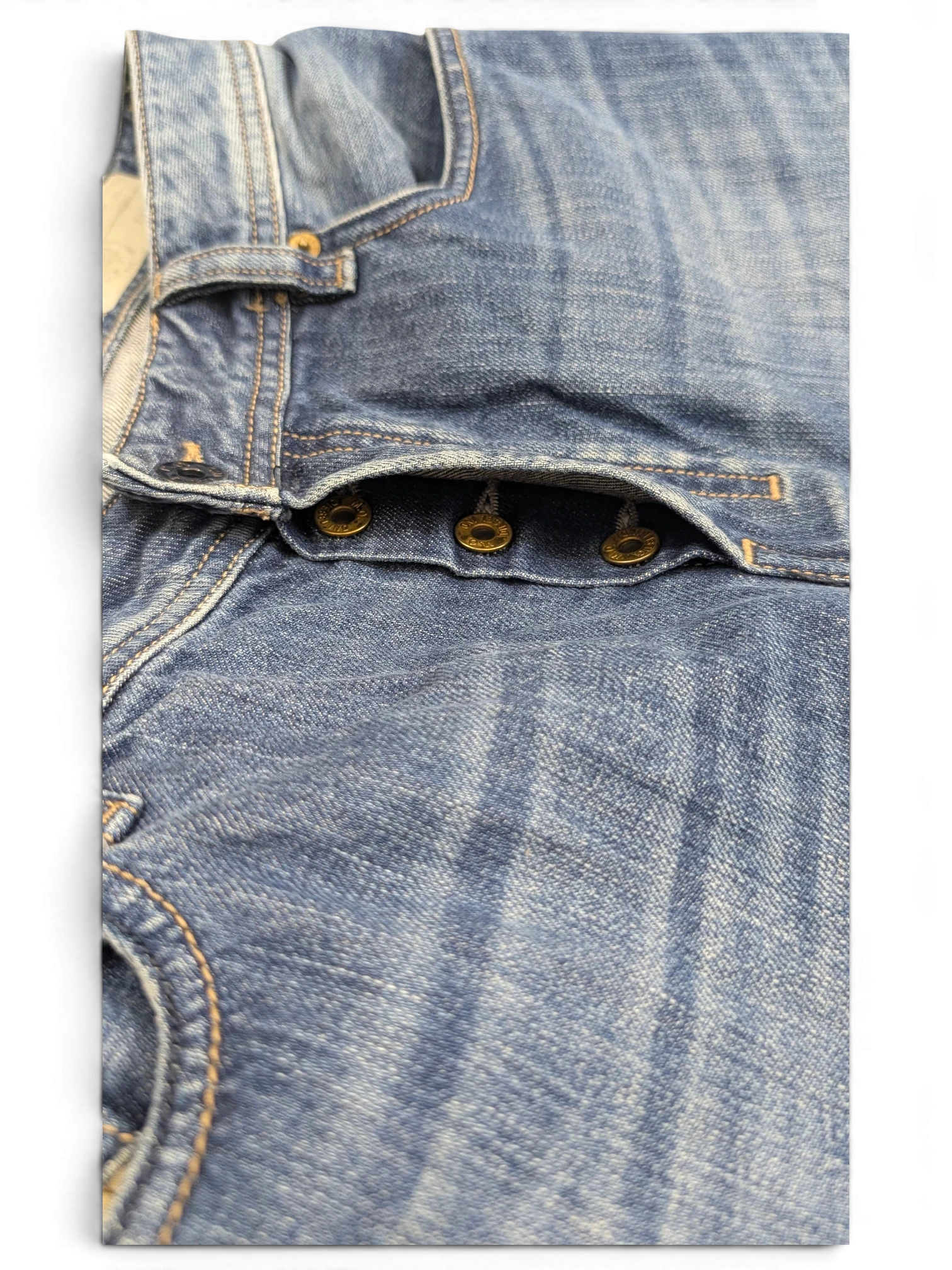 JAKE & IPI Diesel Zatiny bootcut jeans in blue denim with button fly and distressed details.
