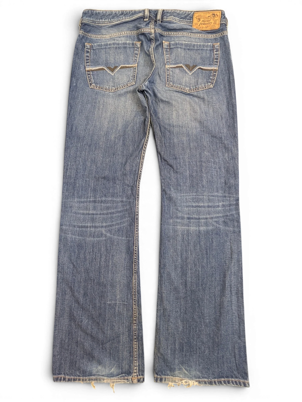 JAKE & IPI Diesel Zatiny bootcut jeans in blue denim, size W34 L32, with distressed hem and V-stitch detail on back pockets.