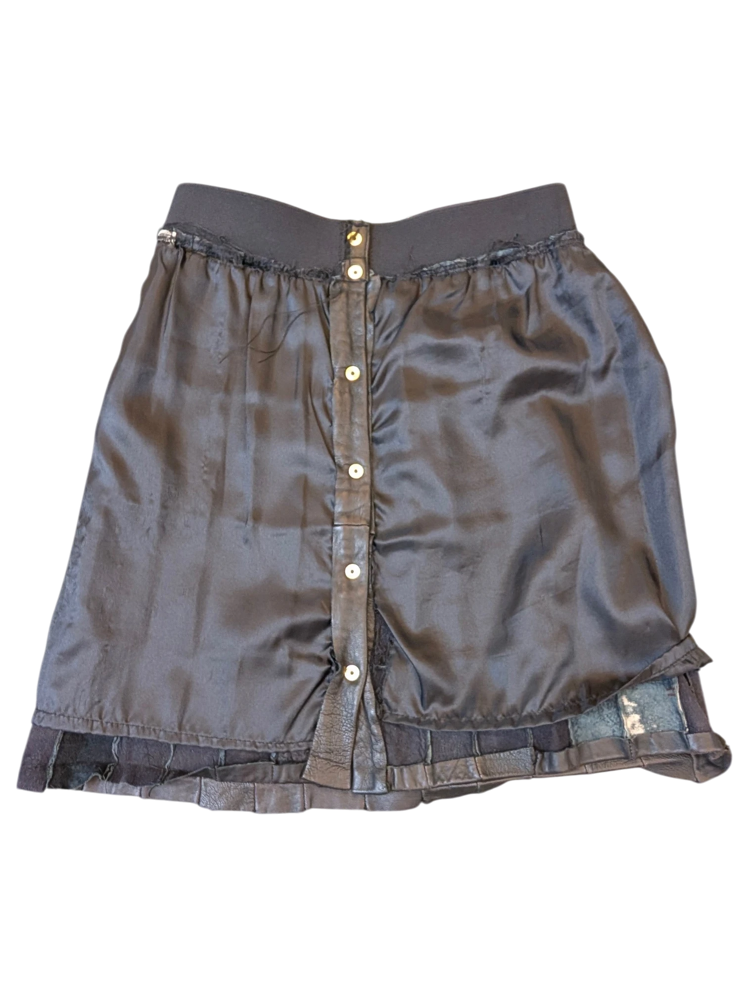 JAKE & IPI black paneled faux leather mini skirt with a button-front closure and elastic waistband.