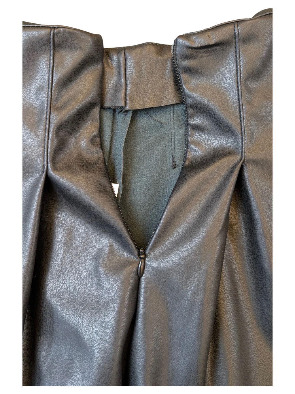 JAKE & IPI black faux leather pleated mini skirt with a concealed back zipper closure and soft interior lining.