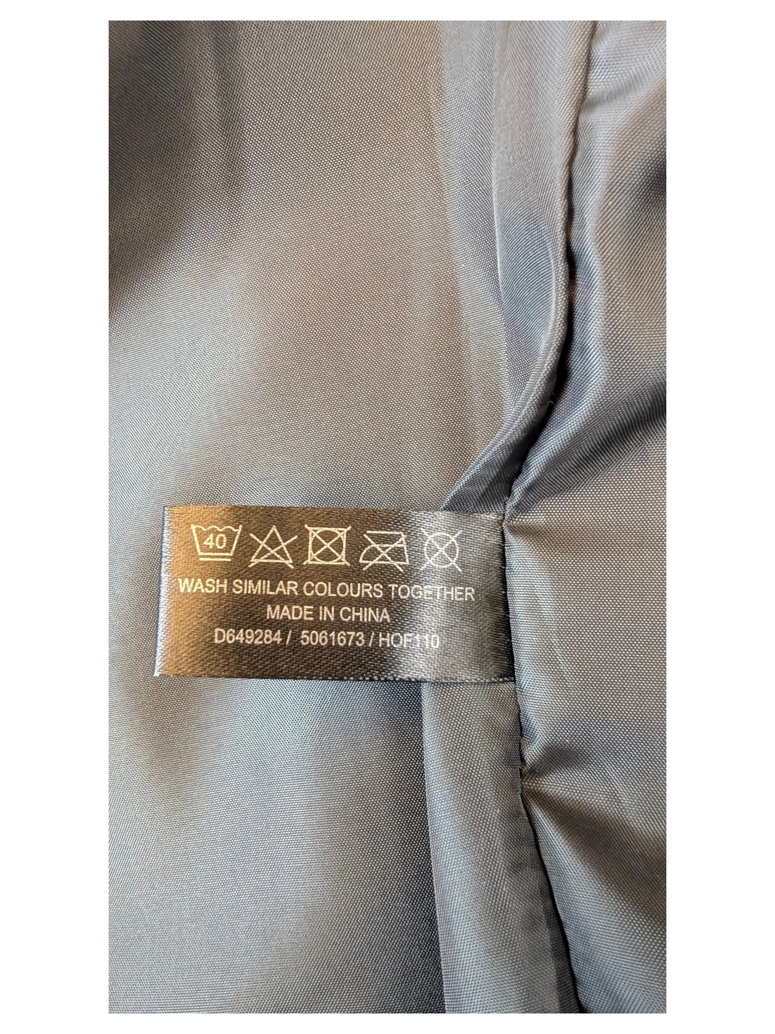 JAKE & IPI Gray & Willow faux leather pencil skirt care label with washing instructions and origin details