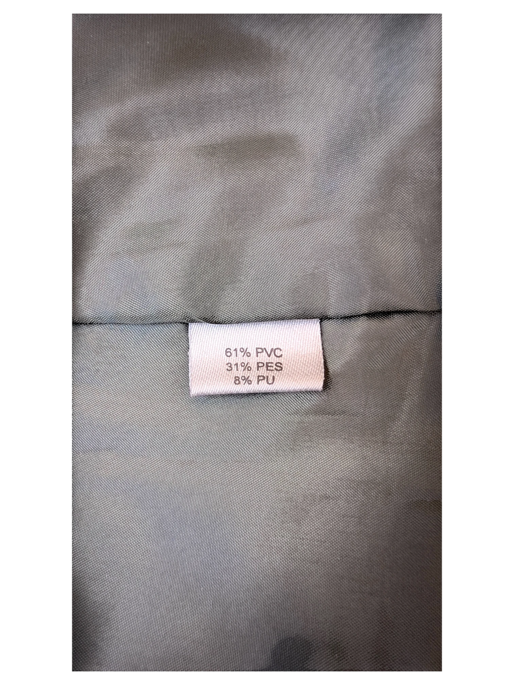 JAKE & IPI Staccato faux leather midi skirt interior label showing material composition of PVC, PES, and PU.