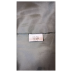 JAKE & IPI Staccato faux leather midi skirt interior label showing material composition of PVC, PES, and PU.