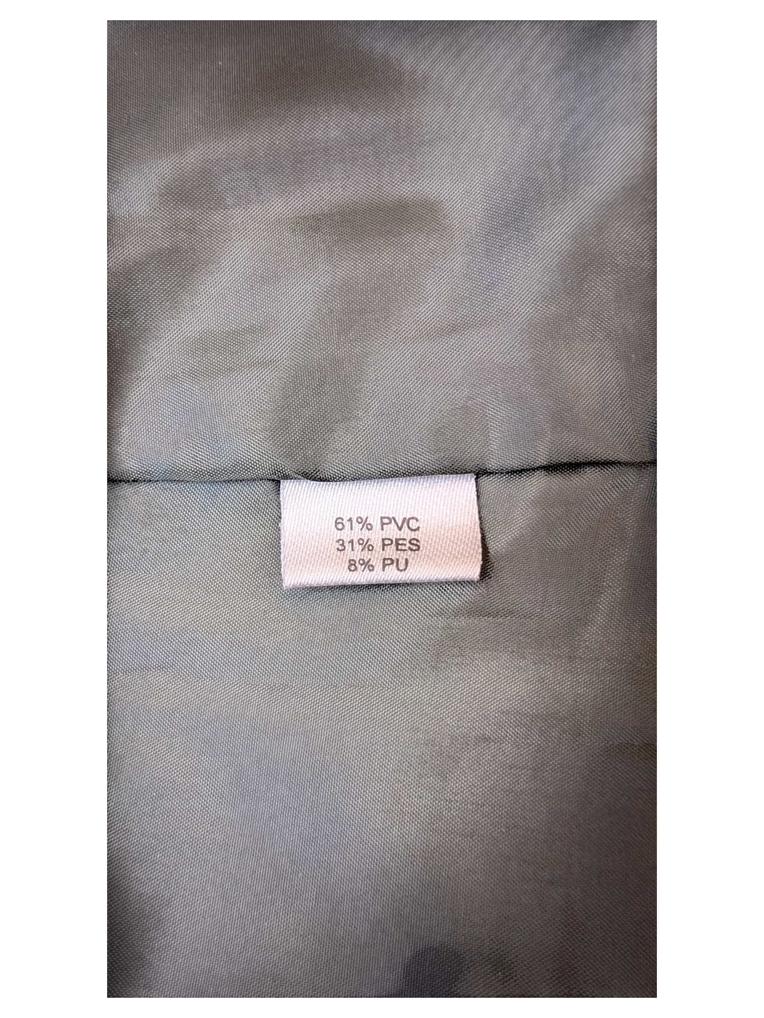 JAKE & IPI Staccato faux leather midi skirt interior label showing material composition of PVC, PES, and PU.
