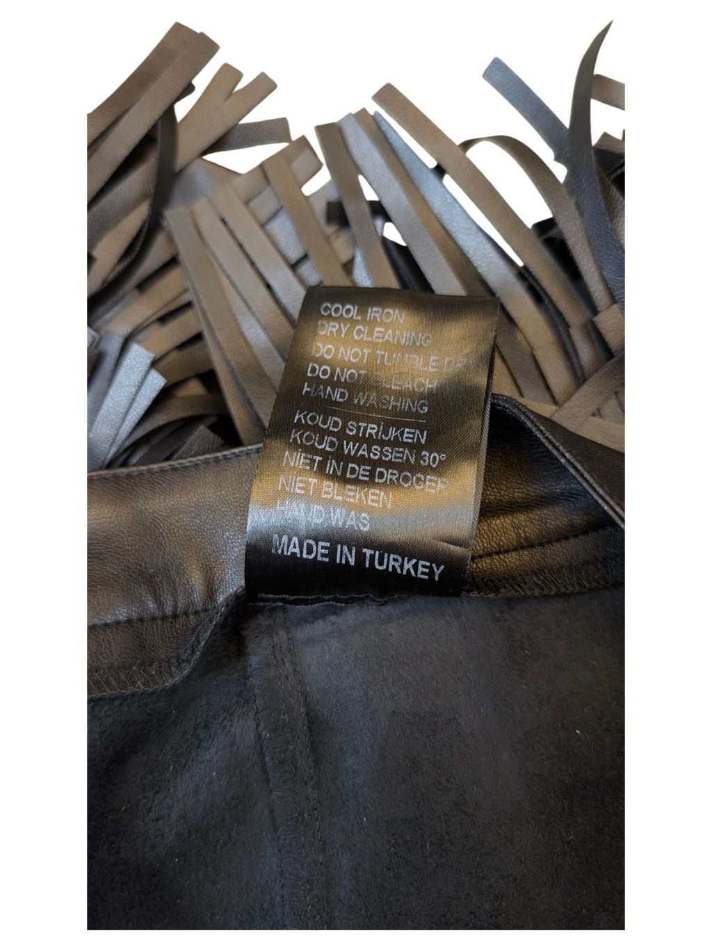JAKE & IPI ROYAL TEMPTATION black faux leather mini skirt with long fringe detail and care label