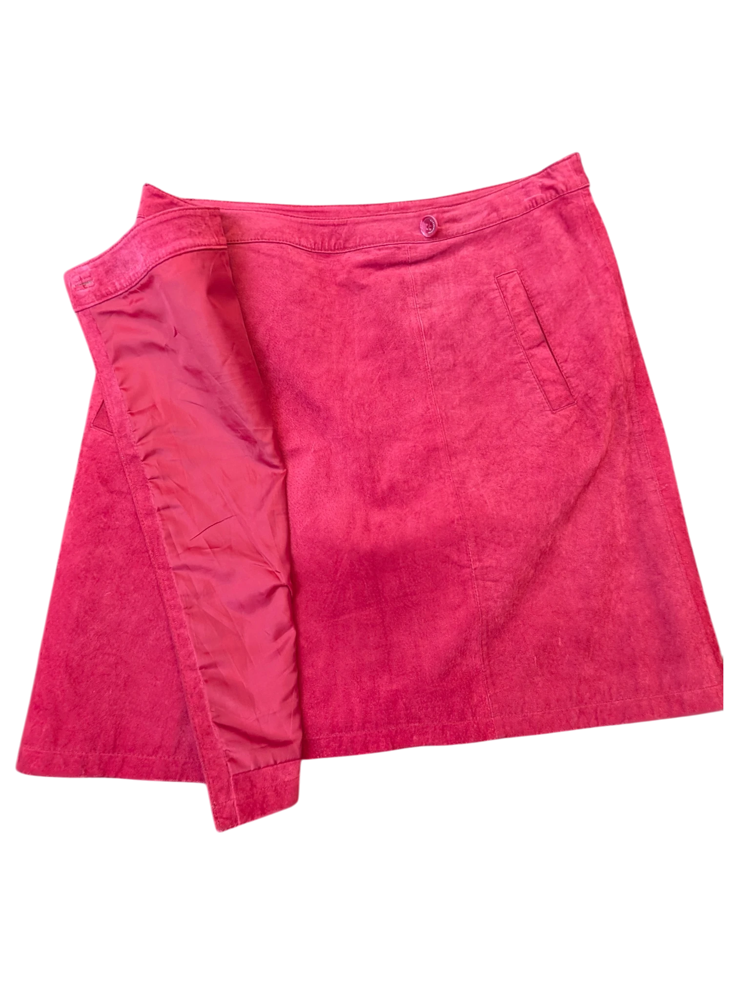 JAKE & IPI fuchsia pink suede leather mini skirt with a button closure and side pocket detail.
