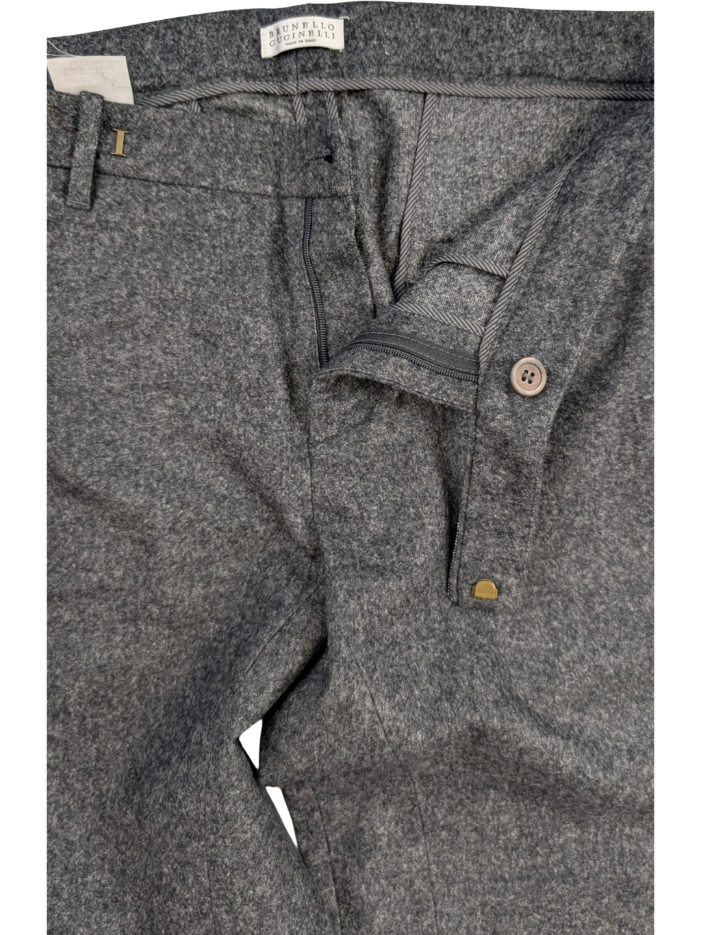 JAKE & IPI grey mélange wool blend flannel tailored trousers with zip fly and button closure.